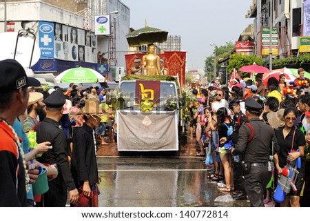 CHIANG MAI THAI-APRIL 13:Chiangmai Songkran festival.The tradition of bathing the Buddha marched on an annual basis. With respect to faith.on April 13,2013 in Chiangmai,Thailand.
