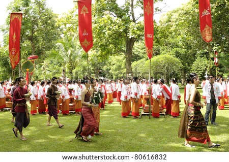 CHIANGMAI,THAILAND-JULY 7:The wai khru ceremony.Male and female Thai traditional costume parade. To pay homage to sacred ceremonies are held annually on July 7,2011 in Chiangmai, Thailand.