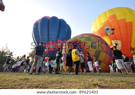 CHIANGMAI THAILAND-NOVEMBER 26 :Thailand International Balloon Festival in Chiangmai.People come to watch the release of balloons in the evening. on November 26,2011 in Chiangmai,Thailand