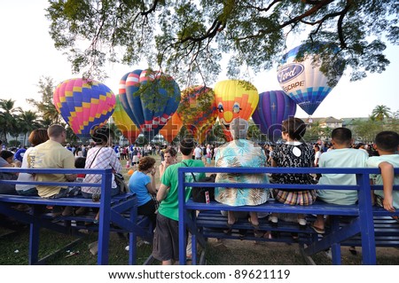 CHIANGMAI THAILAND-NOVEMBER 26 :Thailand International Balloon Festival in Chiangmai.People come to watch the release of balloons in the evening. on November 26,2011 in Chiangmai,Thailand