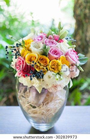 Colorful bouquet of roses to wedding arrangements.