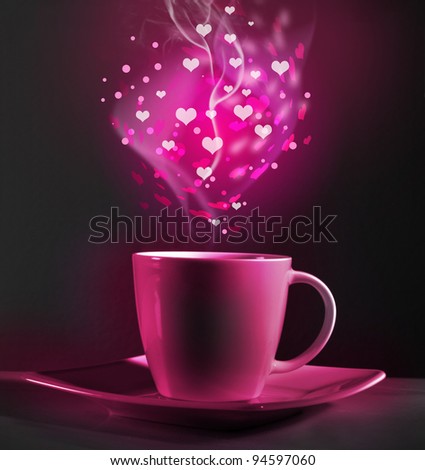 Pink cup of coffee and heart