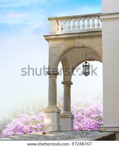 Classical portal with columns in the secret garden.