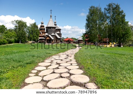 Footpath to old Russian wooden churches in Suzdal. Two churches of the 18th century - the Church of the Transfiguration and the Church of the Resurrection in Suzdal.