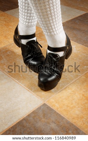 dancing feet in irish stepshoes on dalle floor