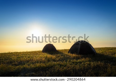 camp tents on the high hill in the morning