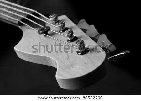 guitar head with pins closeup, black and white