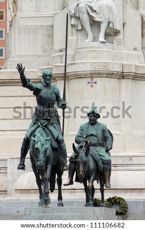 Cervantes monument placed on Plaza de Espana in Madrid, Spain. In front of monument are sculptures of Don Quijote and Sancho Panza