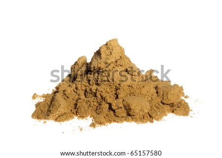 A pile of ground coriander isolated on a white background