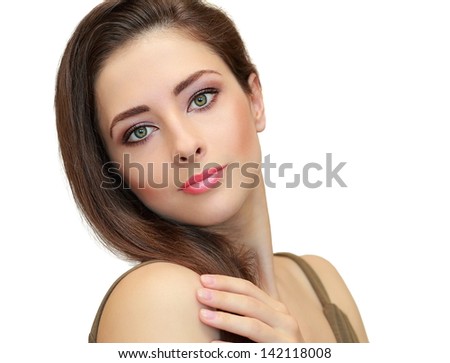 Beautiful woman with green eyes and long hair looking calm isolated on white background
