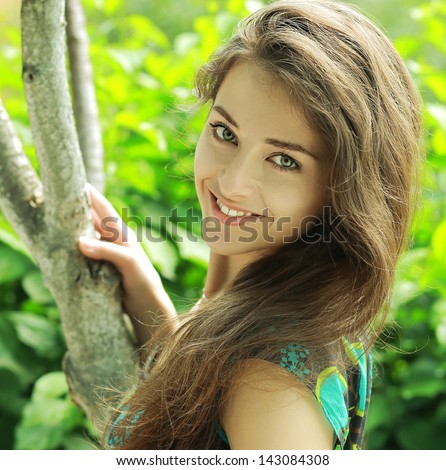 Summer bright beautiful woman portrait with happy smile. Closeup