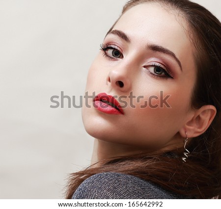Sexy makeup with red lips woman looking. Closeup portrait