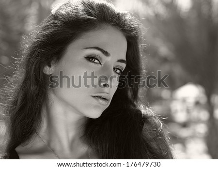 Sexy woman looking on nature. Art black and white portrait