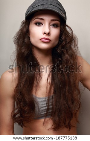 Beautiful long hair woman in fashion cap