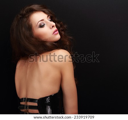 Sexy makeup female profile with nude back on black background