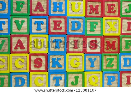 The word Autism made from toy alphabet blocks