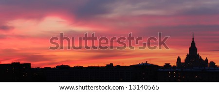 Fantastic sunset with night city