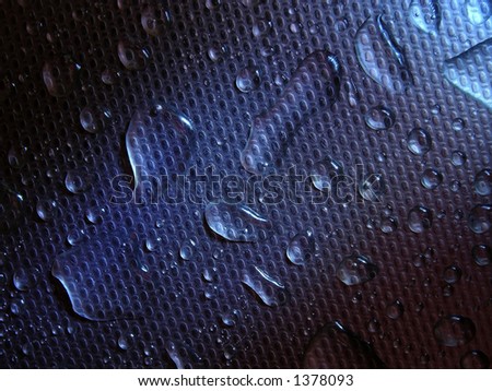 water droplets on metal, blue background, stell