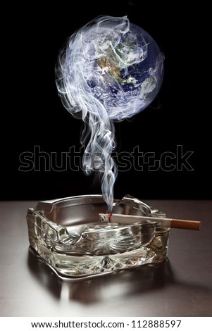 Smoke from cigarette polluting atmosphere. Elements of this image furnished by NASA.