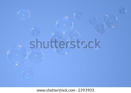 bubbles floating in the bright blue sky