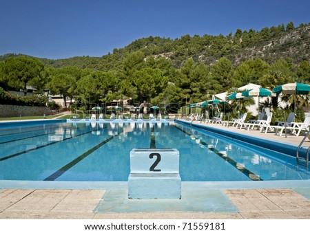 Swimming pool in the sunny sunshine in south Italy