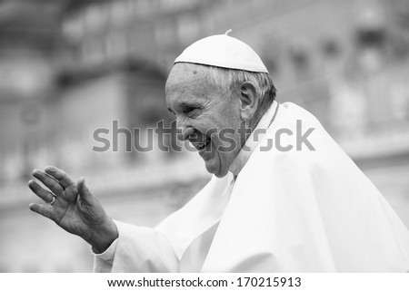 Vatican City - November 13: Pope Francis on the pope mobile bless faithful in St. Peter\'s Square on November 13 2013