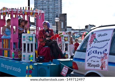 MARGATE, UK-AUGUST 4: Margate Carnival Queen Jadine Griffin and princesses Molly Knight and Chloe Stokes in their float with the Edna Experience, in the Margate carnival. August 4, 2013 Margate, UK