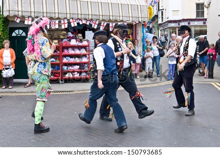 BROADSTAIRS, UK-AUGUST16: Dead Horse Morris dancers perform in the annual Broadstairs Folk week celebrations.  International performers and thousands of visitors attend. August 16, 2013 Broadstairs UK