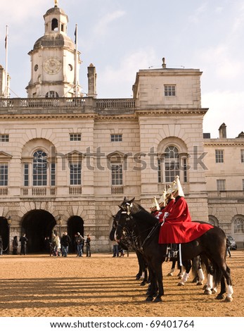 LONDON, UK- JANUARY 19: Members of the Queen\'s Royal Horse Guards, the Royal Life Guard Regiment, at Horse Guards Parade, during the Changing of the Guard Ceremony. January 19, 2011 in London, UK.