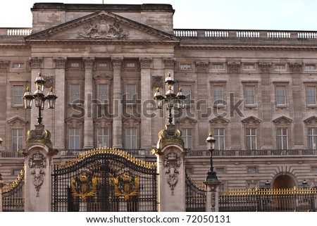 LONDON, UK-JANUARY 19: Buckingham Palace, facade and main gates, home to the Queen and  British Royal Family, shortly to include Kate Middleton. January 19, 2011 in London UK.