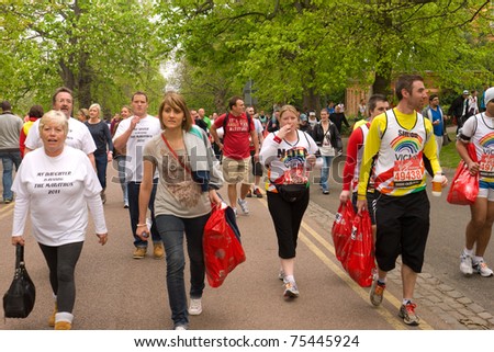 LONDON, UK-APRIL 17: Runners, family members and friends arrive at the start of the London Marathon in Greenwich Park on April 17, 2011 in London UK.