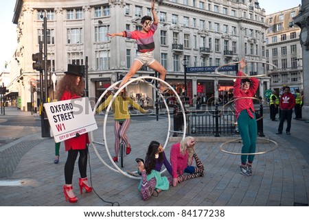 LONDON, UK-SEPTEMBER 5: Oxford Street\'s High Street Fashion Week launched with a circus themed fashion shoot at the iconic Oxford Circus,  ahead of London Fashion Week. September 5, 2011 in London UK