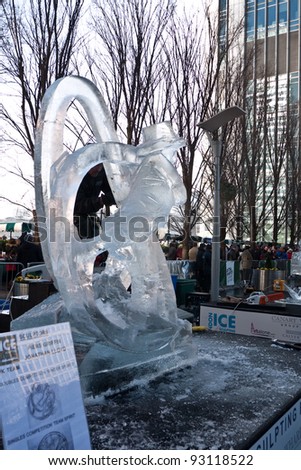 LONDON, UK- JANUARY 14: The UK ice sculpture under construction at the London Ice Sculpting Festival. The Annual festival was held in Canary Wharf, January 14, 2012 in London UK.