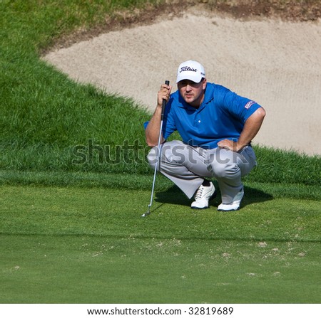CROMWELL, CT - JUNE 28: Golfer Ben Curtis on the 18th green for the final round of the Travelers Championship at TPC River Highlands Golf Course on June 28, 2009 in Cromwell, CT