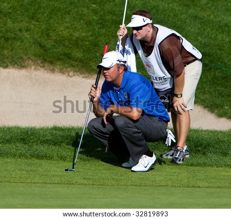 CROMWELL, CT - JUNE 28: Golfer Bo Van Pelt lines up his putt on 18 during the final round of the Travelers Championship at TPC River Highlands Golf Course on June 28, 2009 in Cromwell, CT