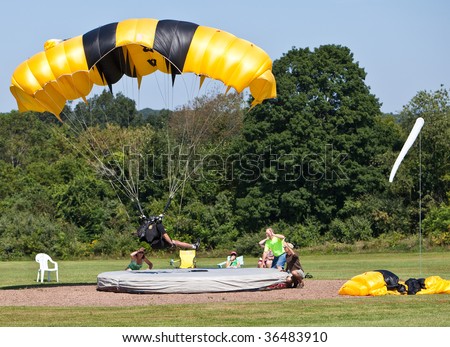 ELLINGTON, CT - SEPT 4: Sky divers compete in the North American Cup, a sky diving accuracy competition, next to the Ellington Airport on September 4, 2009 in Ellington, Connecticut.