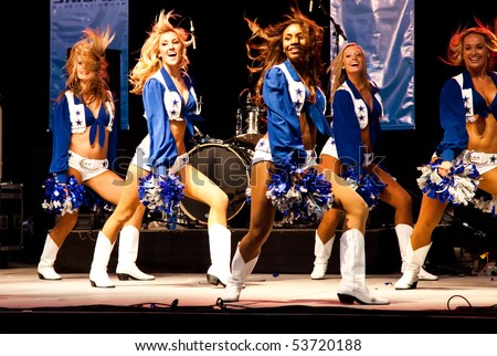 DALLAS - MAY 17.  Dallas Cowboys Cheerleaders perform routines for the American Association of Airport Executives convention held at the Cowboys Stadium on May 17, 2010 at Dallas, Texas.