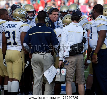 EL PASO – DECEMBER 31:  Georgia Tech\'s Paul Johnson, Head Coach, talks to his team  during UTAH’s overtime 30 to 27 win over Georgia Tech at the Sun Bowl on December 31, 2011 in El Paso, Texas.