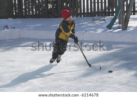 Playing ice hockey on an outdoor ice rink