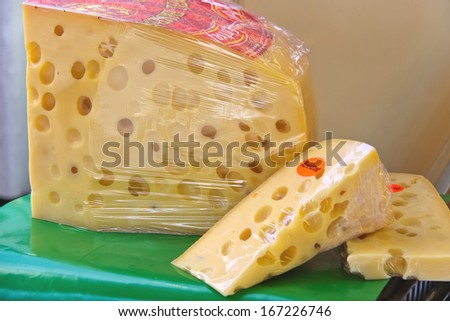 DORDRECHT, THE NETHERLANDS - SEPTEMBER 28: Cheese on sale in the market in the festive city on September 28, 2013 in Dordrecht, Netherlands