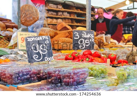 DELFT, THE NETHERLANDS - APRIL 7, 2012 : Sale of food products on the market  in Delft, Netherlands