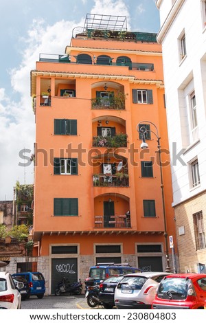 ROME, ITALY - MAY 03, 2014: Cars are parked in the courtyard of a house in Rome, Italy