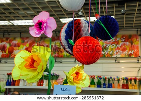 Amsterdam Schiphol, Netherlands - April 18, 2015: Artificial flowers and balloons decorate the gift shop at the airport Amsterdam Schiphol, Netherlands