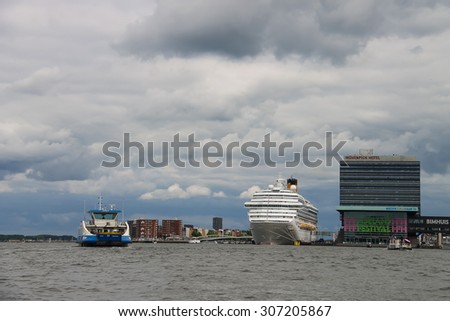 Amsterdam, Netherlands - June 20, 2015: Cruise ship Costa Fortuna stands in the passenger terminal of Amsterdam