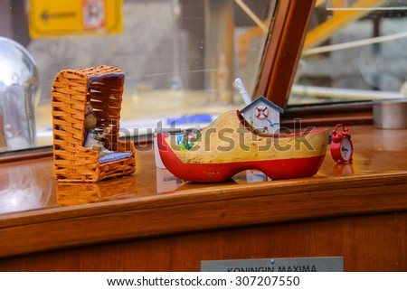 Amsterdam, Netherlands - June 20, 2015: Souvenir jewelry in the captain\'s cabin of cruise boat