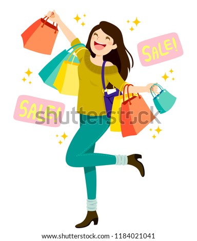 Happy young woman holding shopping bags and enjoying sales