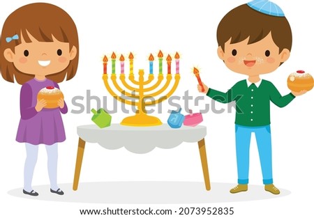 Kids celebrating Hanukkah by lighting candles in the menorah, eating doughnuts and playing with dreidels
