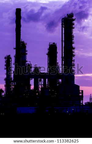 silhouette of oil refinery plant at twilight morning