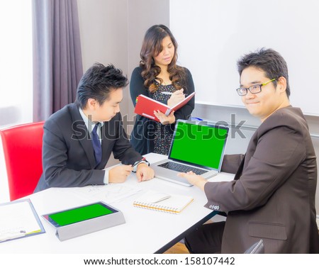 business man presenting product to customer at the office