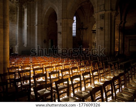 Sun shines inside an empty church in France